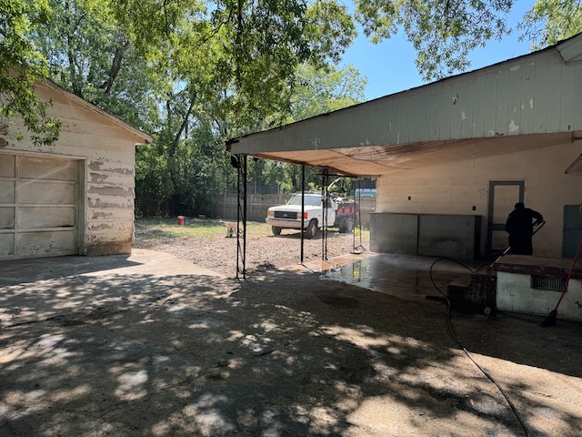 exterior space featuring a carport