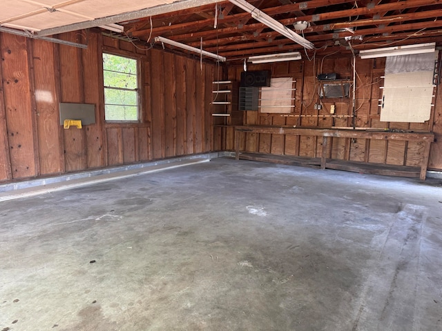 garage with wood walls