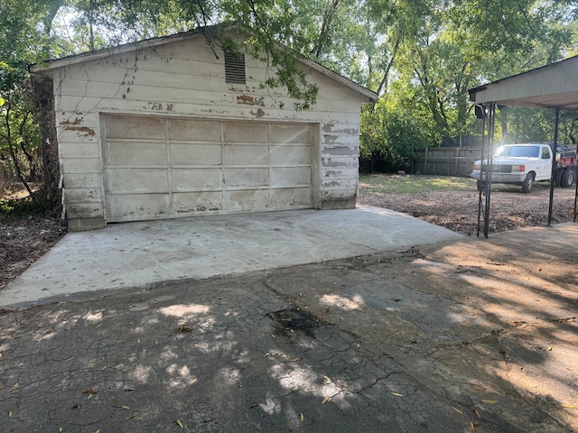 garage with a carport