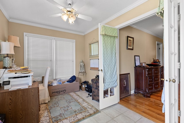 interior space featuring ornamental molding, ceiling fan, and light hardwood / wood-style floors