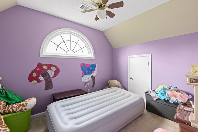 bedroom with carpet, vaulted ceiling, and ceiling fan