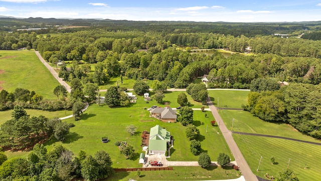 birds eye view of property featuring a rural view