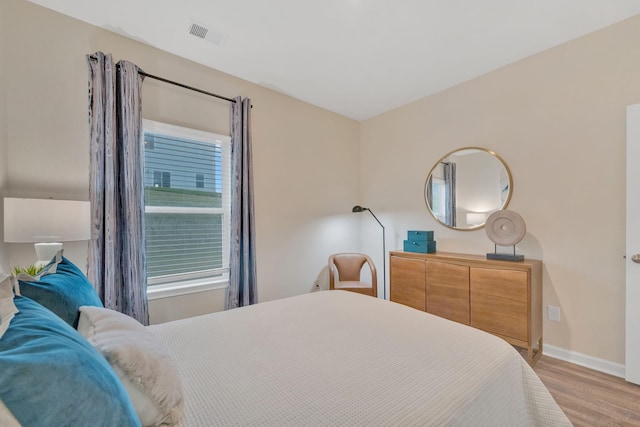 bedroom featuring light hardwood / wood-style flooring