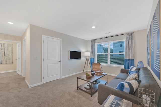 living room featuring light colored carpet