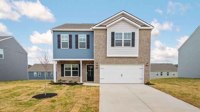 craftsman-style home with a garage, brick siding, concrete driveway, and a front yard