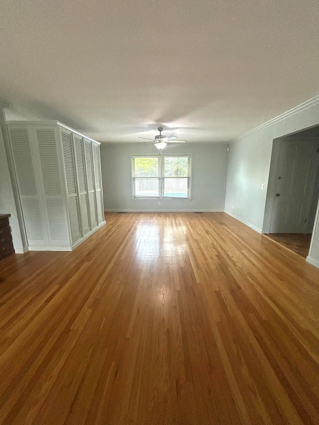 spare room featuring a textured ceiling, ceiling fan, and hardwood / wood-style flooring