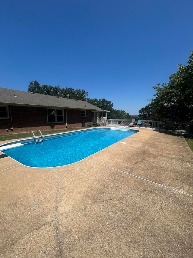 view of pool with a patio area