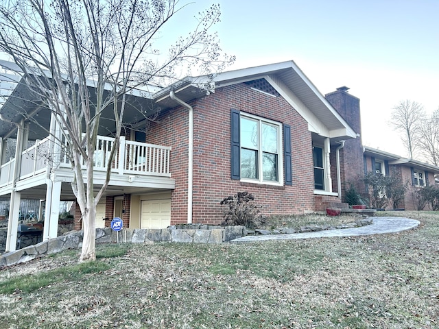 view of side of property featuring a garage