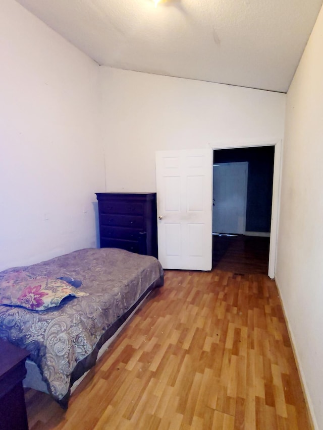 bedroom with light hardwood / wood-style flooring