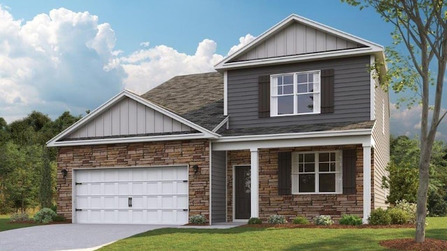 view of front of property with driveway, a front yard, board and batten siding, and an attached garage