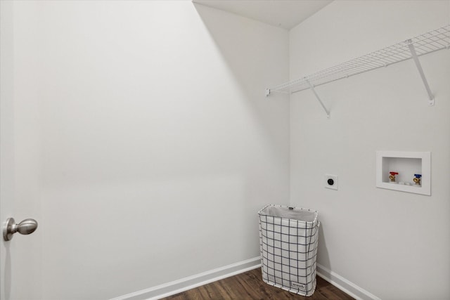 washroom with washer hookup, dark hardwood / wood-style floors, and electric dryer hookup