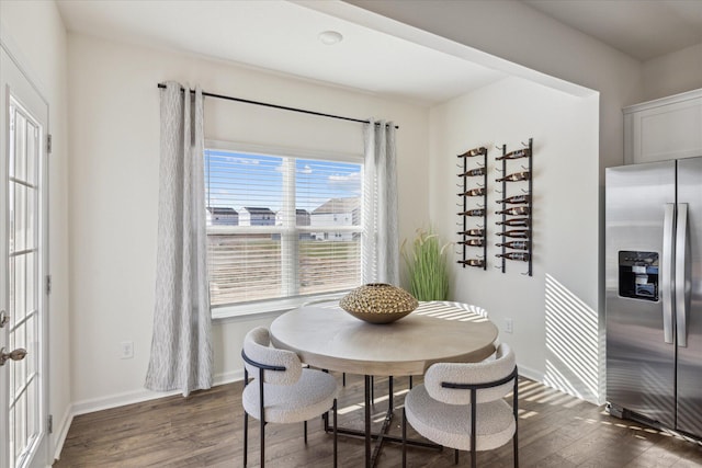 dining room featuring dark wood-type flooring