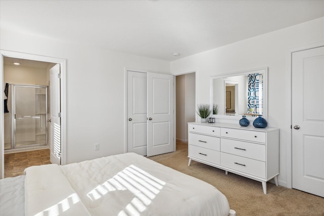 carpeted bedroom featuring connected bathroom