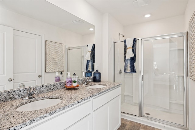 bathroom featuring vanity and walk in shower