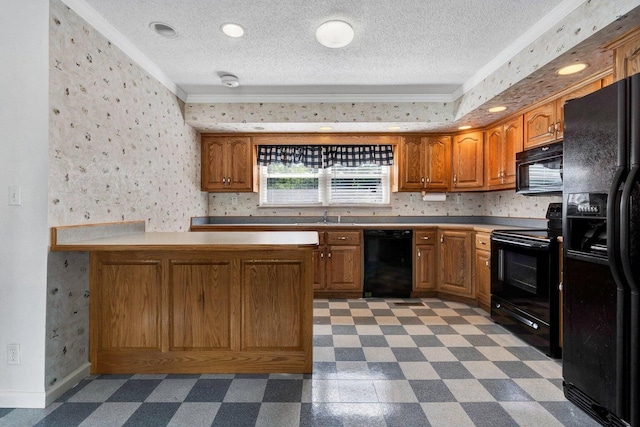 kitchen featuring brown cabinetry, ornamental molding, tile patterned floors, a sink, and black appliances