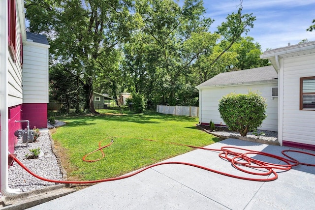 view of yard with a patio and fence