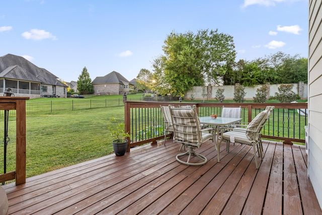 deck featuring a lawn