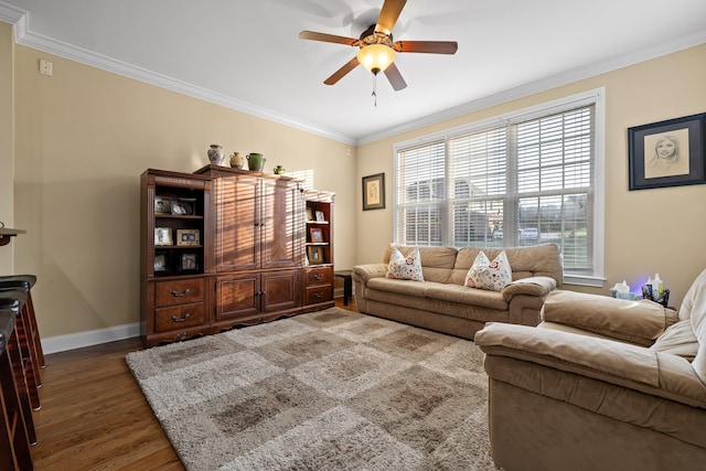 living room featuring ornamental molding, dark hardwood / wood-style flooring, and ceiling fan