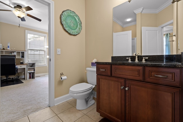 bathroom with vanity, tile patterned flooring, crown molding, toilet, and ceiling fan