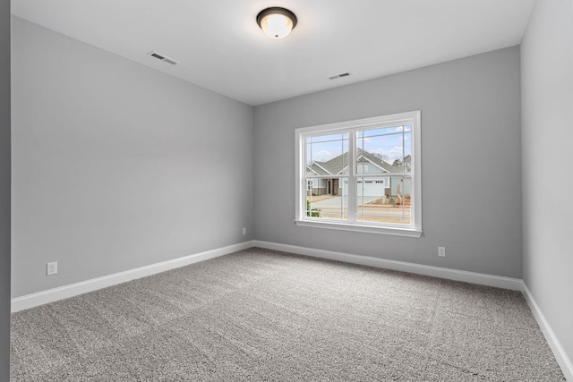 view of carpeted spare room