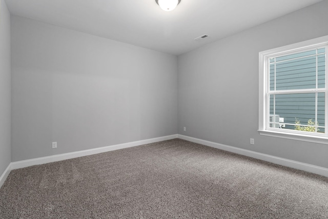 spare room with carpet flooring