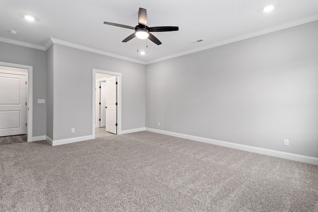 unfurnished bedroom featuring light colored carpet, ceiling fan, and ornamental molding