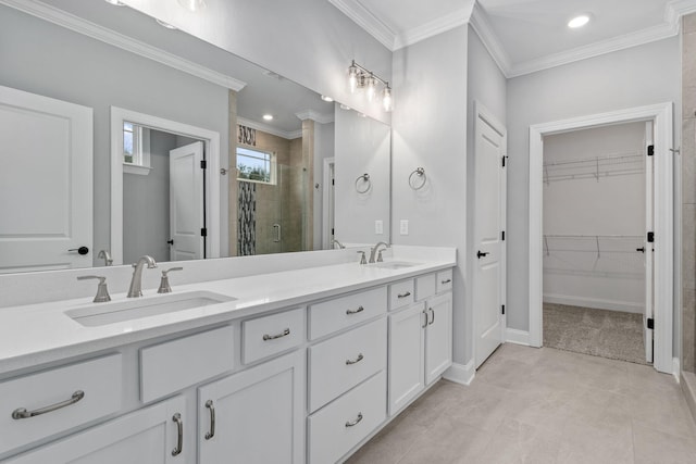 bathroom with ornamental molding, walk in shower, and vanity