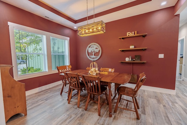 dining space featuring light hardwood / wood-style floors