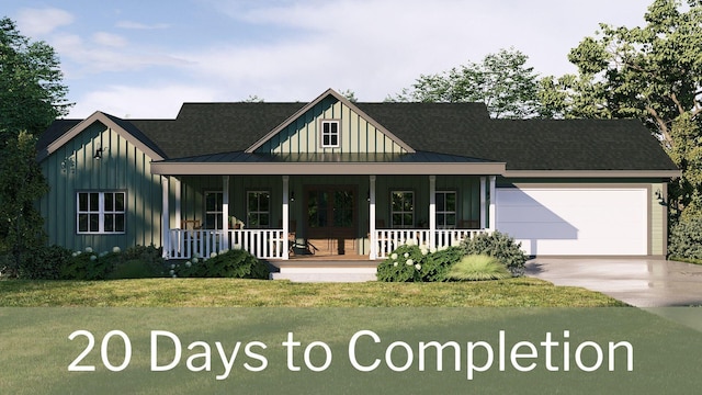 view of front facade with a garage, covered porch, and a front lawn