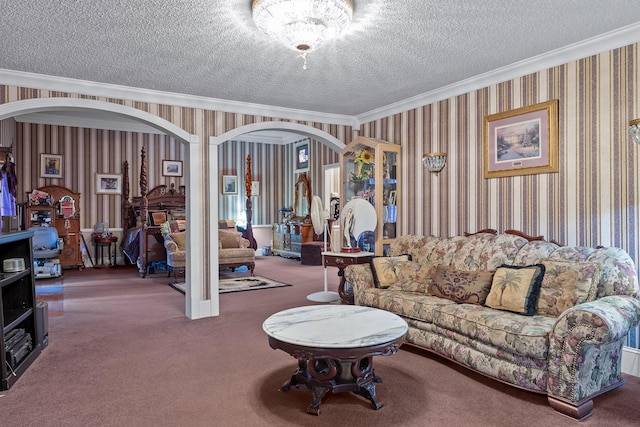 carpeted living area featuring wallpapered walls, arched walkways, ornamental molding, and a textured ceiling
