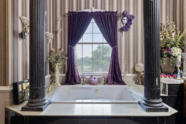 full bathroom featuring a bath and wallpapered walls