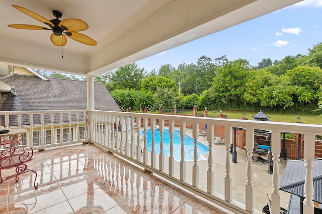 balcony featuring ceiling fan and a patio