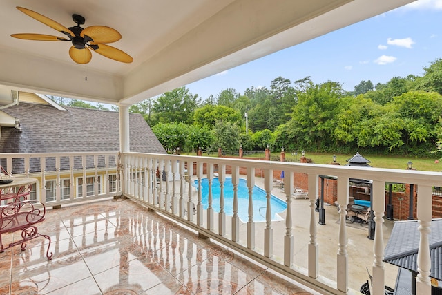 balcony featuring ceiling fan and a patio area