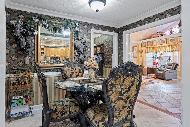 dining room featuring a textured ceiling, wallpapered walls, light tile patterned floors, and ornamental molding