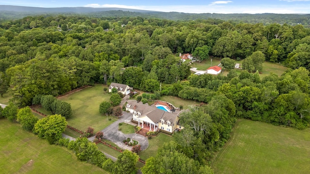 aerial view featuring a view of trees