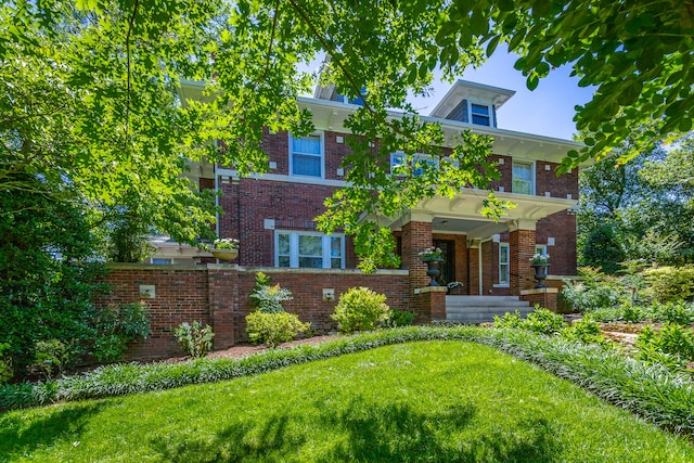 view of front of house with a front lawn