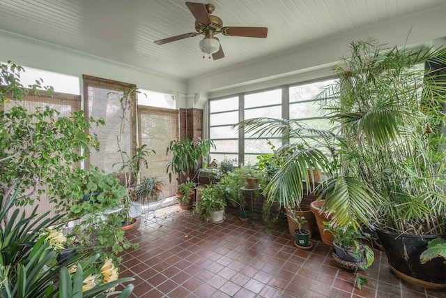 sunroom / solarium with ceiling fan