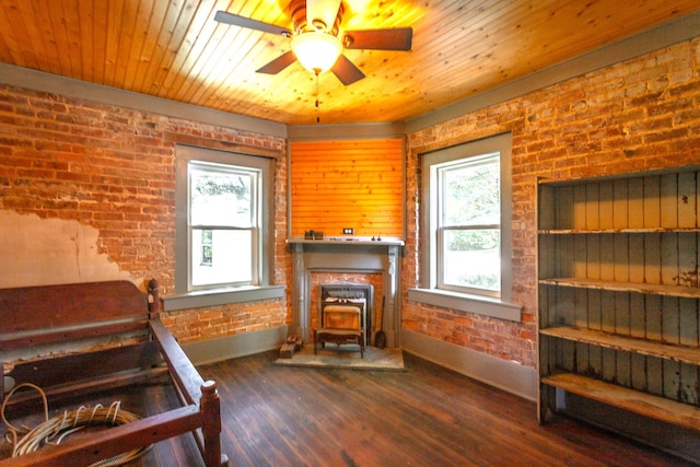 interior space with a wood stove, brick wall, dark hardwood / wood-style floors, and wooden ceiling