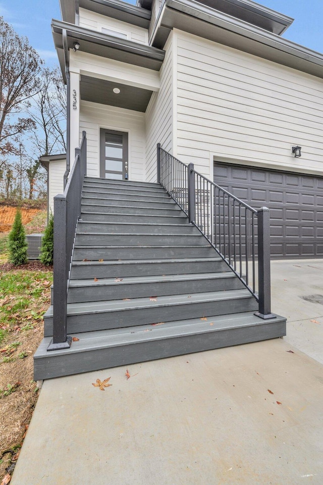 doorway to property featuring a garage