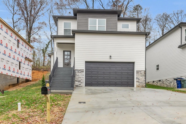 view of front of property featuring a garage