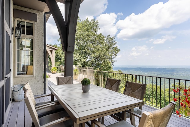 deck featuring a water view