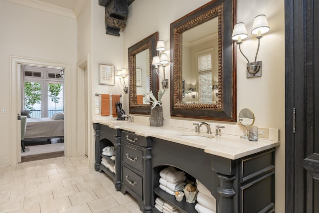 bathroom featuring crown molding, vanity, and tile patterned floors