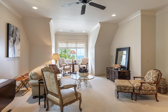 interior space with carpet flooring, ceiling fan, and crown molding