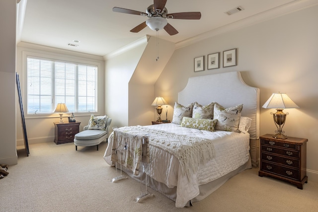 bedroom with crown molding, light colored carpet, and ceiling fan