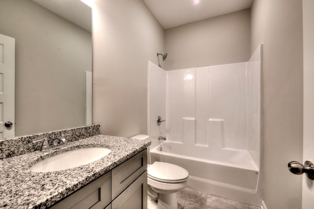 full bathroom with tile patterned floors, vanity, toilet, and tub / shower combination