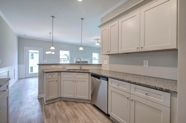 kitchen featuring stainless steel dishwasher, kitchen peninsula, sink, and ceiling fan with notable chandelier