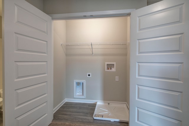 washroom with hookup for a washing machine, hookup for an electric dryer, and dark hardwood / wood-style flooring