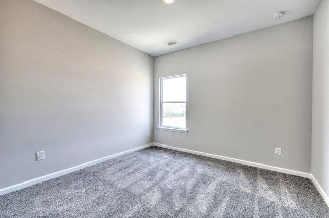 spare room with carpet floors