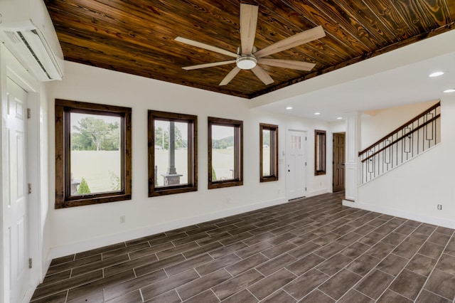 unfurnished living room featuring wood ceiling, ceiling fan, a wall unit AC, and dark hardwood / wood-style flooring