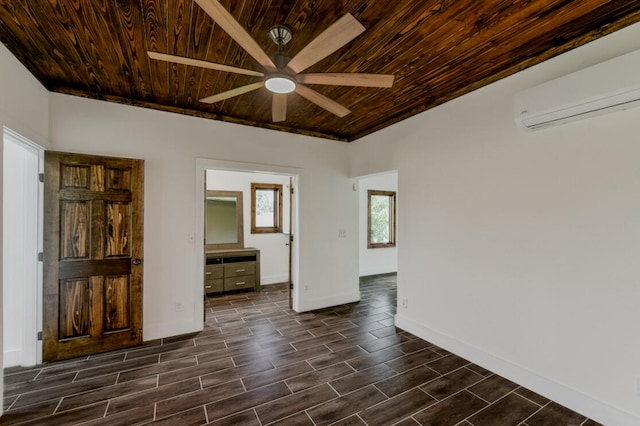 empty room featuring dark hardwood / wood-style flooring, ceiling fan, an AC wall unit, and wooden ceiling